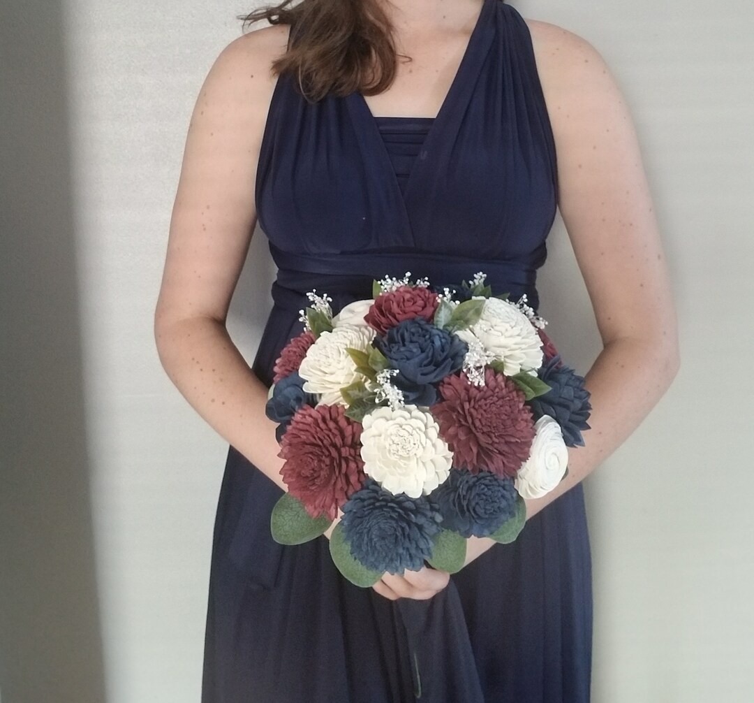 navy bridesmaid dresses with red flowers Bridesmaids in Navy Blue Dresses, Bouquets of Pink and Blush Roses